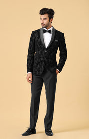 A luxurious black velvet suit, perfect for formal occasions.
