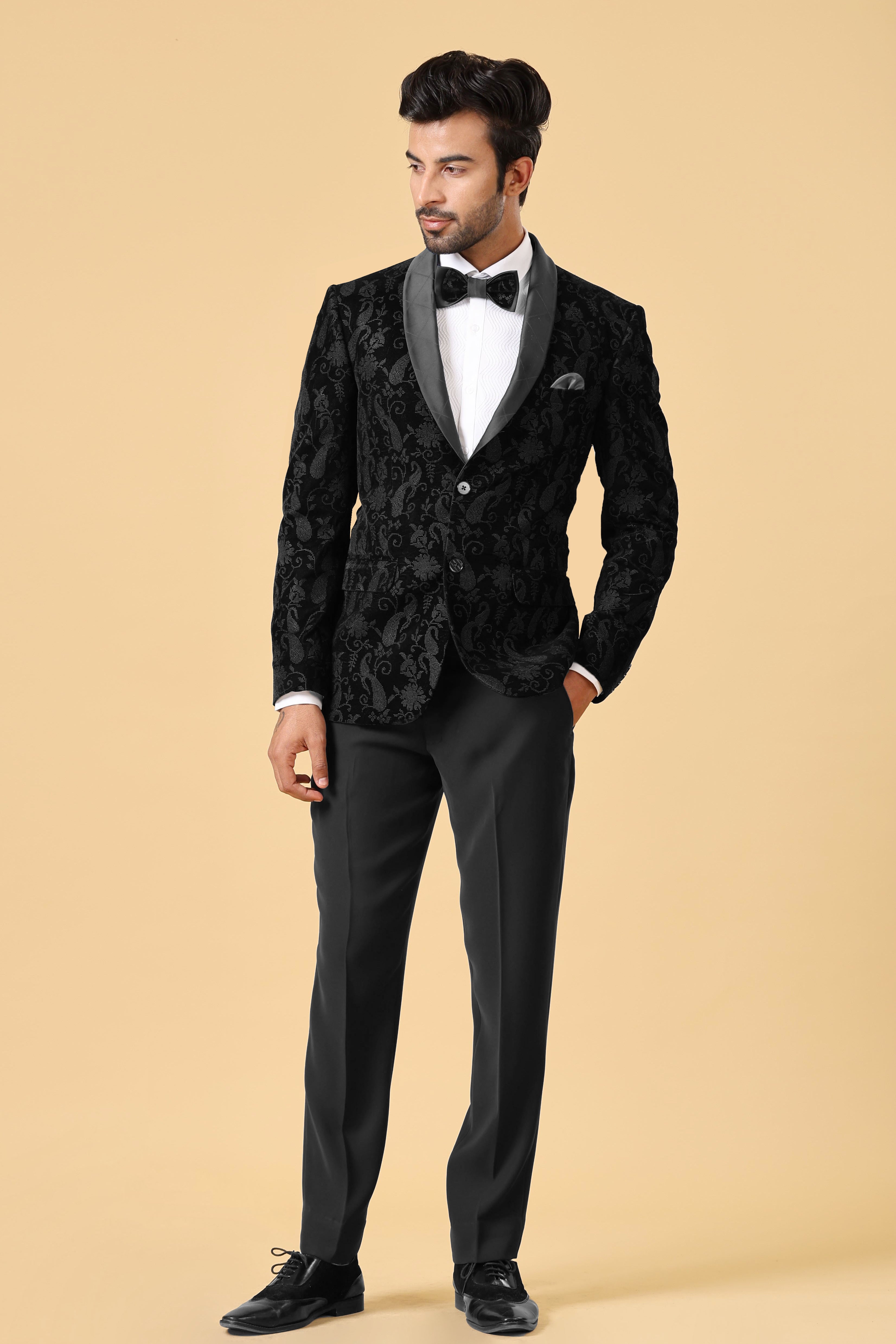 A luxurious black velvet suit, perfect for formal occasions.
