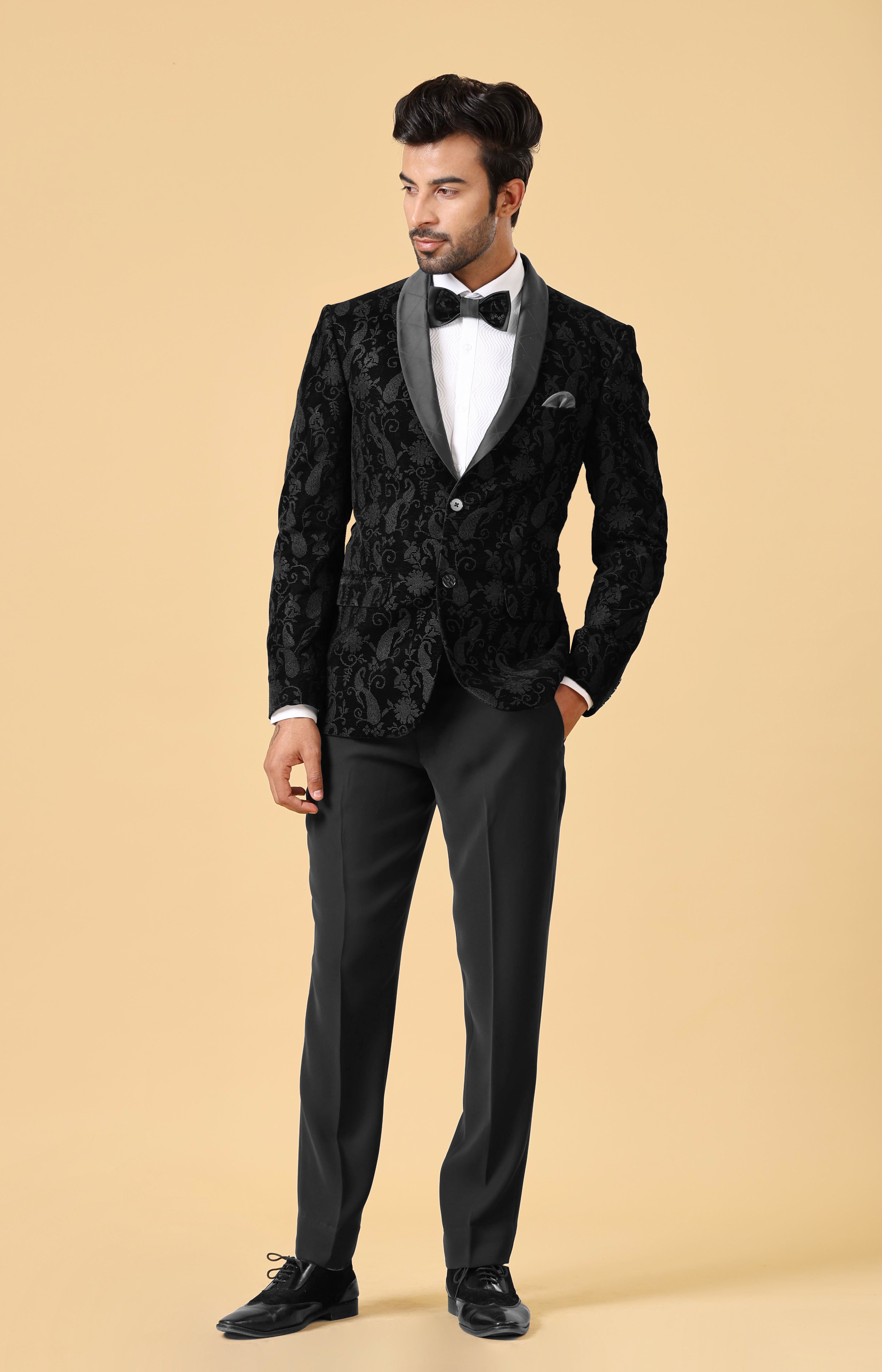 A luxurious black velvet suit, perfect for formal occasions.
