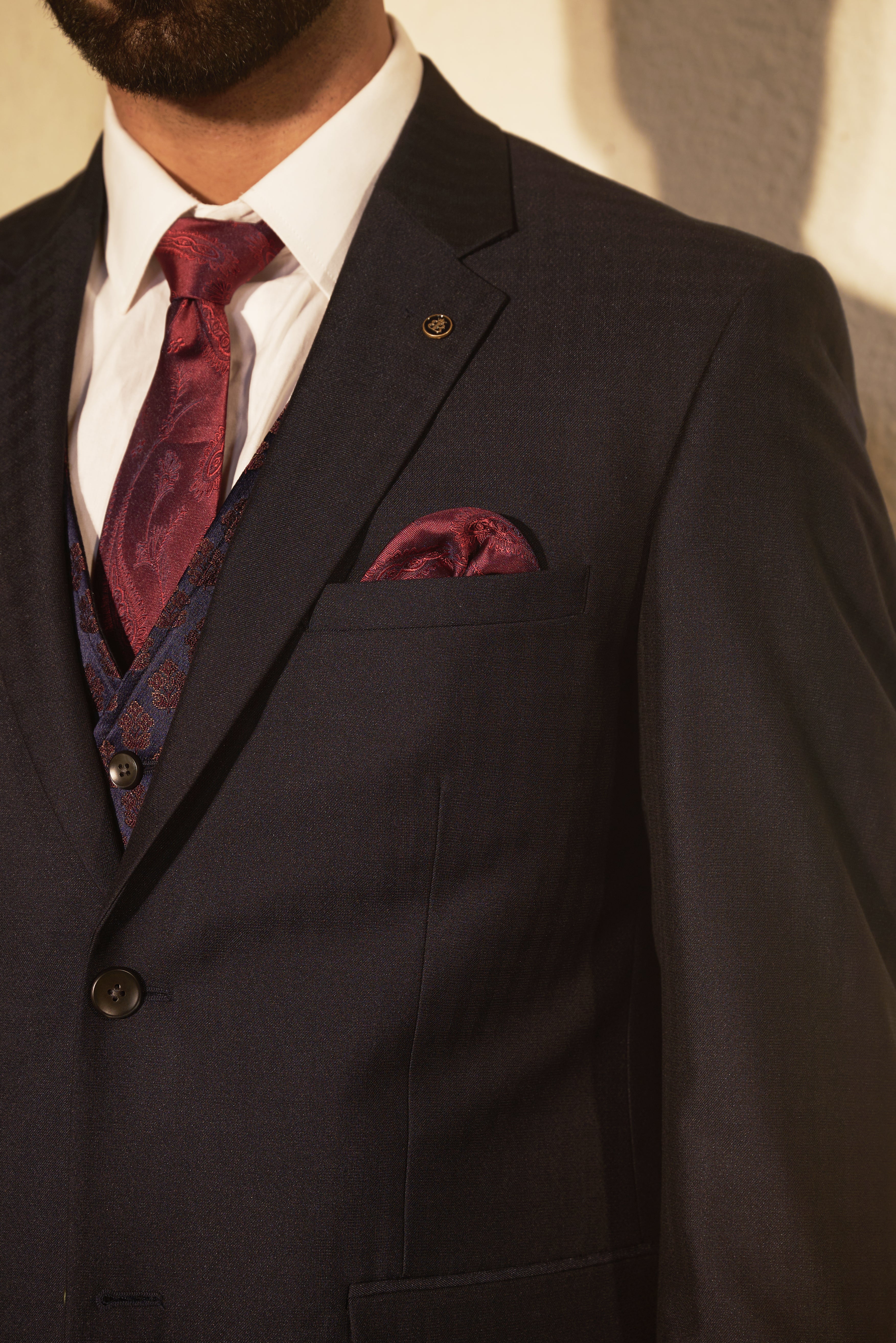 A stylish grey self-checked 5-piece suit, perfect for weddings and formal occasions.
