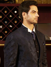 A stylish navy blue tuxedo suit, the epitome of elegance.
