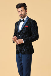 An elegant teal embroidered suit, modern men's fashion.
