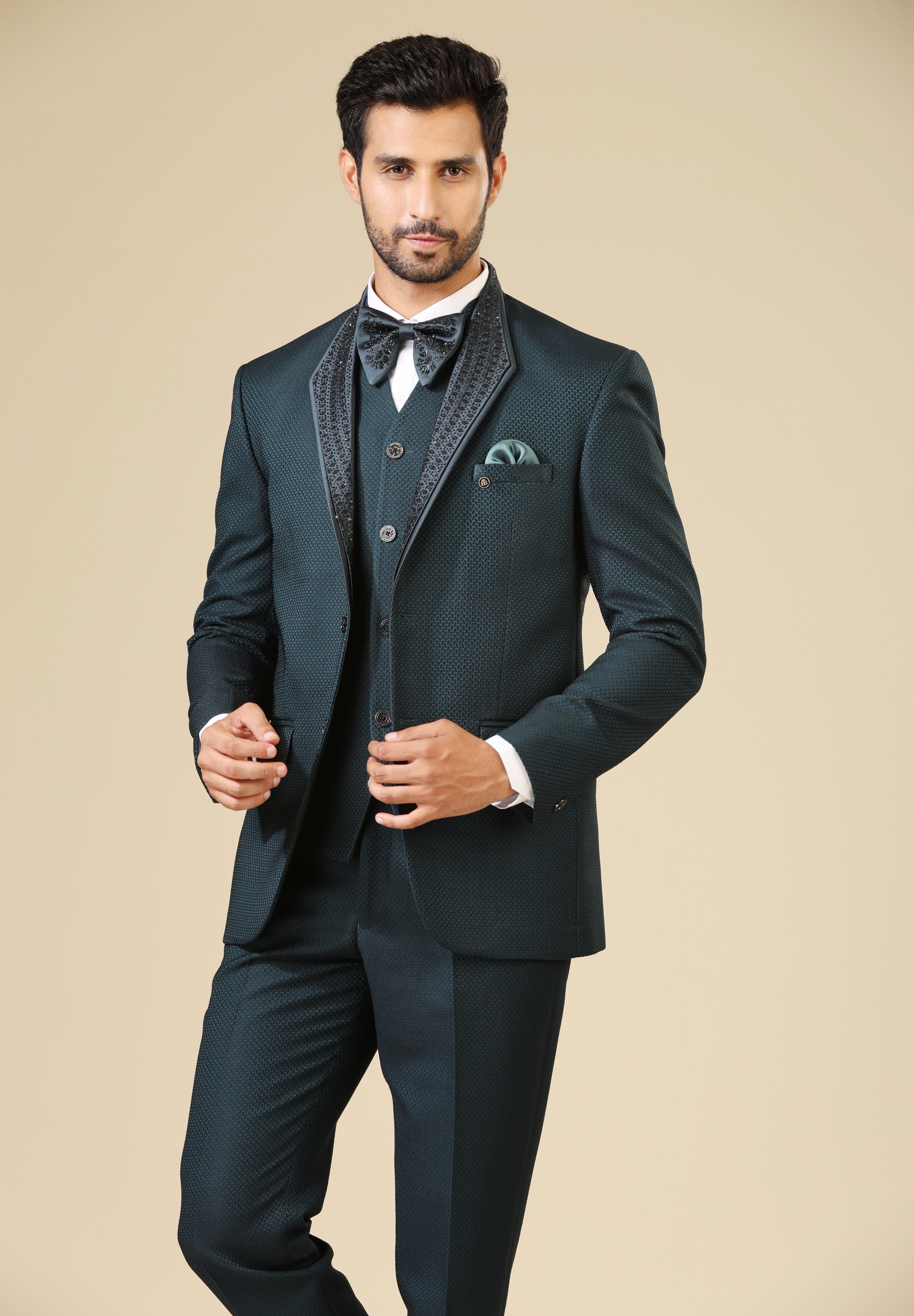 A versatile teal embroidered tuxedo suit, suitable for various formal occasions.
