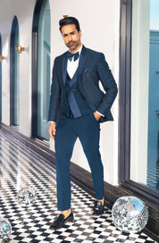 An elegant teal suit, modern men's fashion.