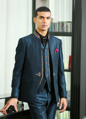 A luxurious teal embroidered suit with cravat, perfect for special occasions.
