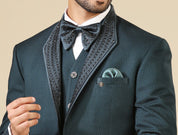 A stylish teal embroidered tuxedo suit, perfect for black-tie events.
