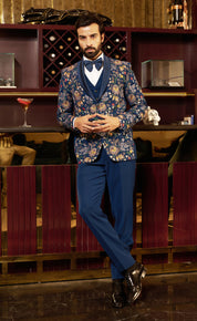 A teal fully embroidered suit, designer wear.
A timeless teal fully embroidered suit.